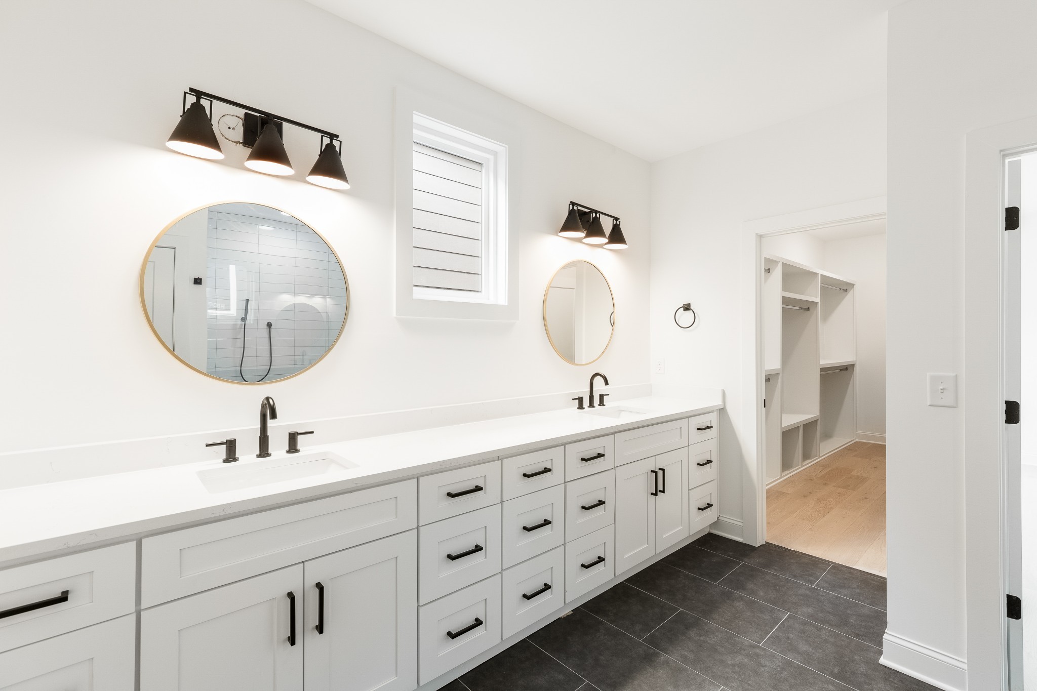 2012 Owen Street, Unit A Nashville, TN 37208 - Photo 24 of 32 a bathroom with a double vanity sink mirror and