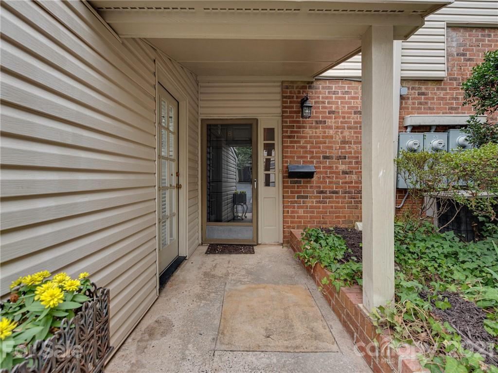 5939 Quail Hollow Road, Unit B Charlotte, NC 28210 - Photo 1 of 23 a view of a pathway besides a house