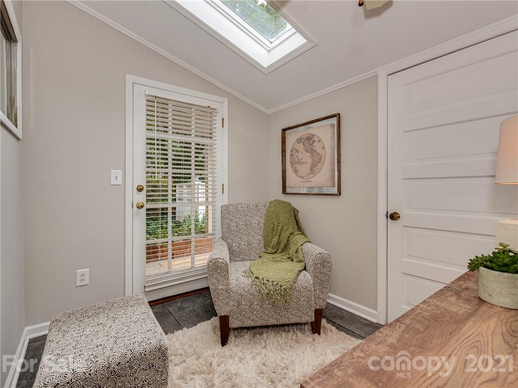 5939 Quail Hollow Road, Unit B Charlotte, NC 28210 - Photo 13 of 23 a living room with furniture and a window