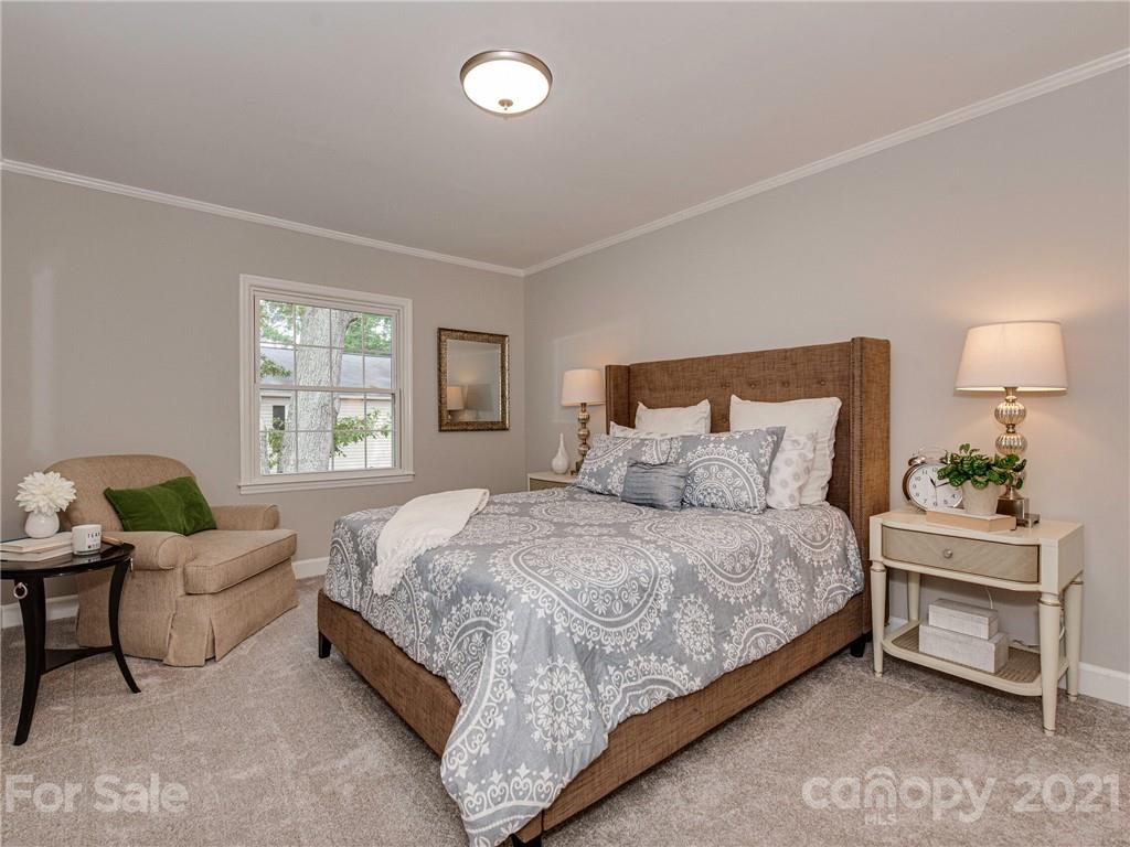 5939 Quail Hollow Road, Unit B Charlotte, NC 28210 - Photo 14 of 23 a bedroom with bed and a window