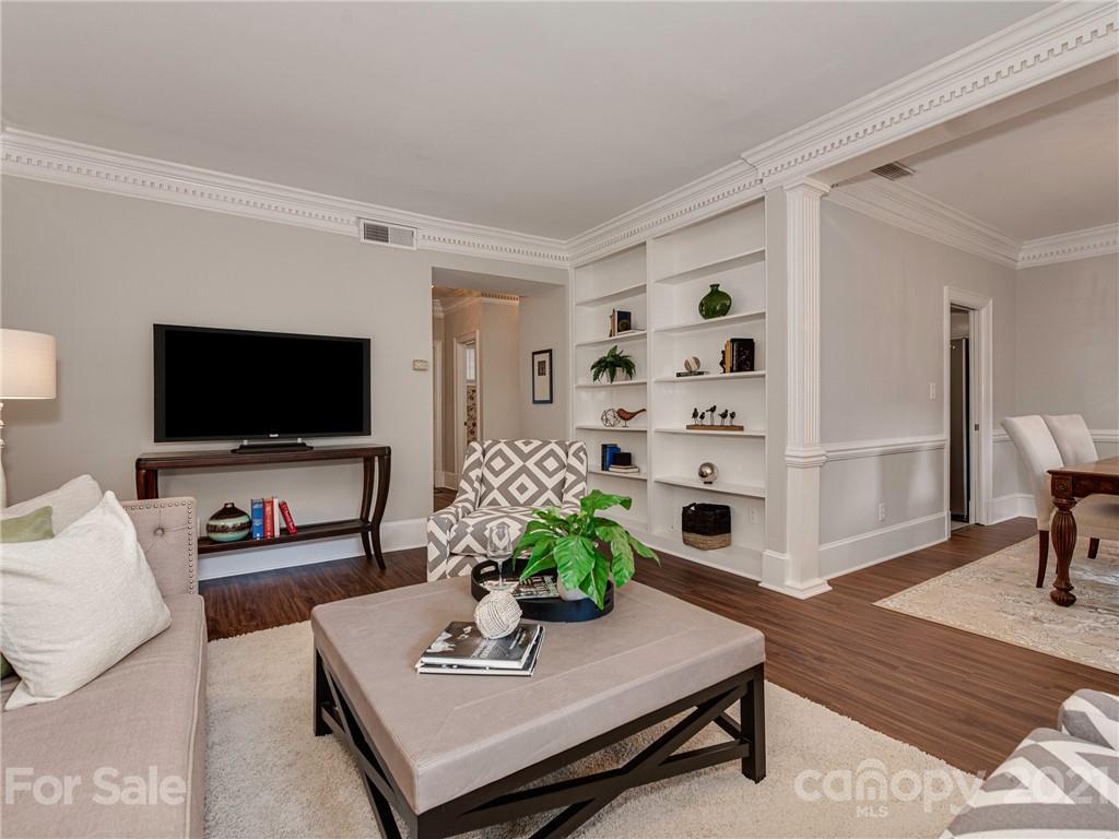 5939 Quail Hollow Road, Unit B Charlotte, NC 28210 - Photo 4 of 23 a living room with furniture and a flat screen tv