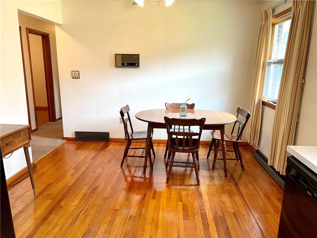 362 Carbon Center Road Butler, PA 16002 - Photo 11 of 43 a view of a dining room with furniture and wooden floor