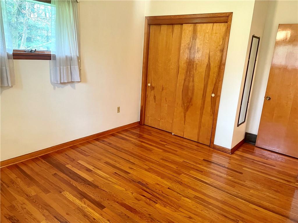 362 Carbon Center Road Butler, PA 16002 - Photo 16 of 43 a view of a room with wooden floor and small window