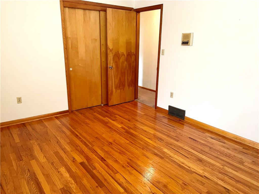 362 Carbon Center Road Butler, PA 16002 - Photo 19 of 43 a view of an empty room with wooden floor