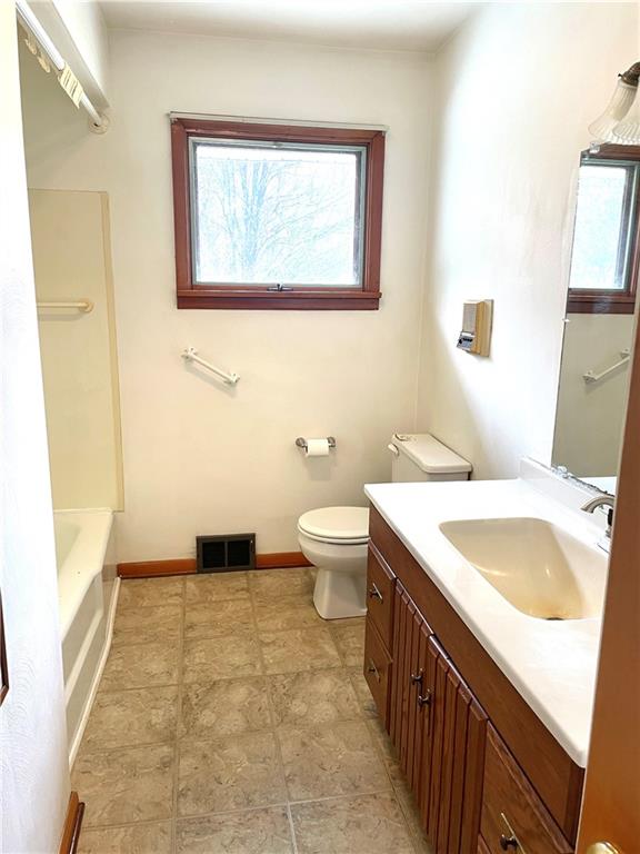 362 Carbon Center Road Butler, PA 16002 - Photo 21 of 43 a bathroom with a sink a toilet and a large mirror