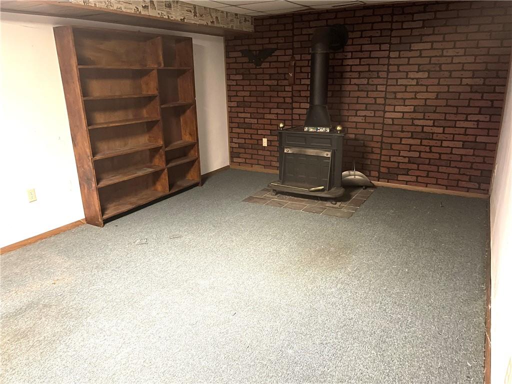 362 Carbon Center Road Butler, PA 16002 - Photo 22 of 43 a view of an empty room with brick wall