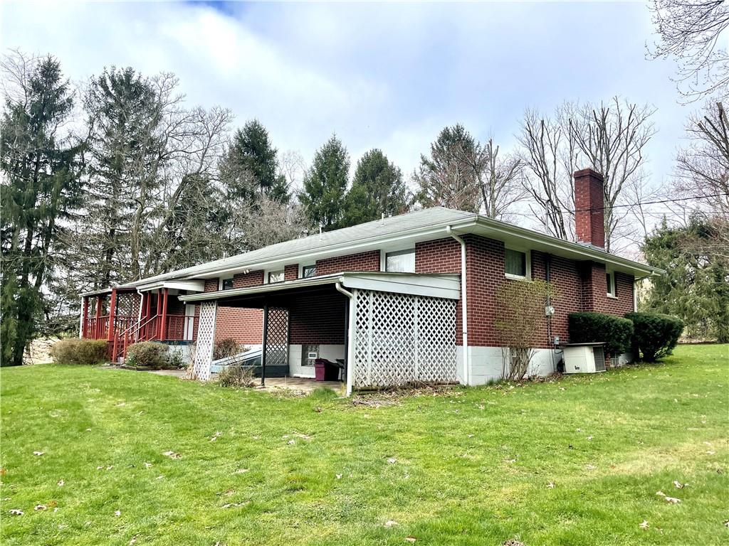 362 Carbon Center Road Butler, PA 16002 - Photo 34 of 43 a front view of house with yard and trees