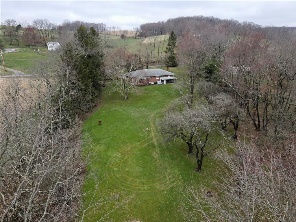 362 Carbon Center Road Butler, PA 16002 - Photo 38 of 43 a view of a lake with a mountain in the back