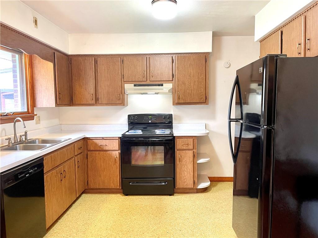 362 Carbon Center Road Butler, PA 16002 - Photo 4 of 43 a kitchen with a refrigerator sink and stove
