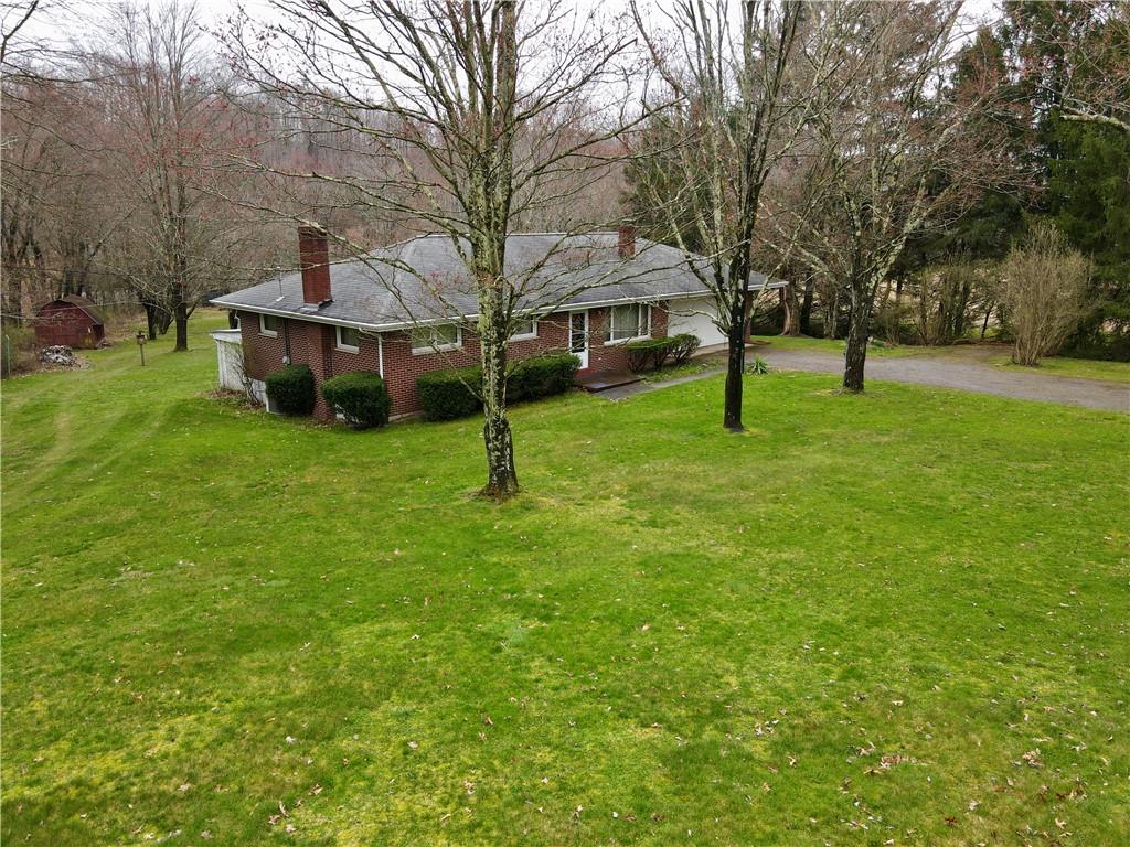 362 Carbon Center Road Butler, PA 16002 - Photo 43 of 43 a view of a house with a yard
