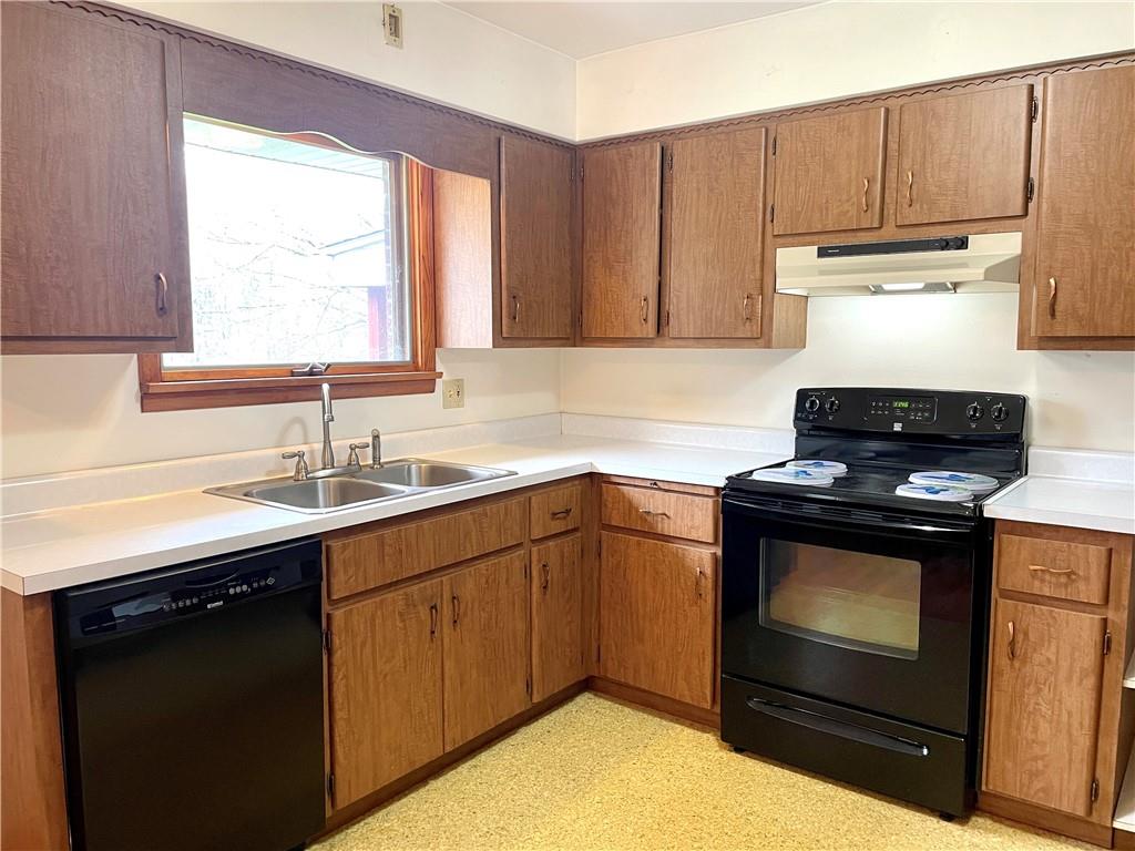 362 Carbon Center Road Butler, PA 16002 - Photo 5 of 43 a kitchen with sink cabinets and window