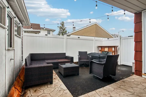 a view of a backyard of the house