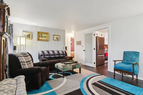 a living room with furniture and a couch