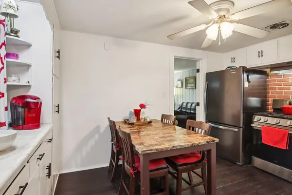 a table and chairs in a kitchen