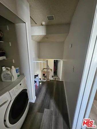a view of living room washer and dryer