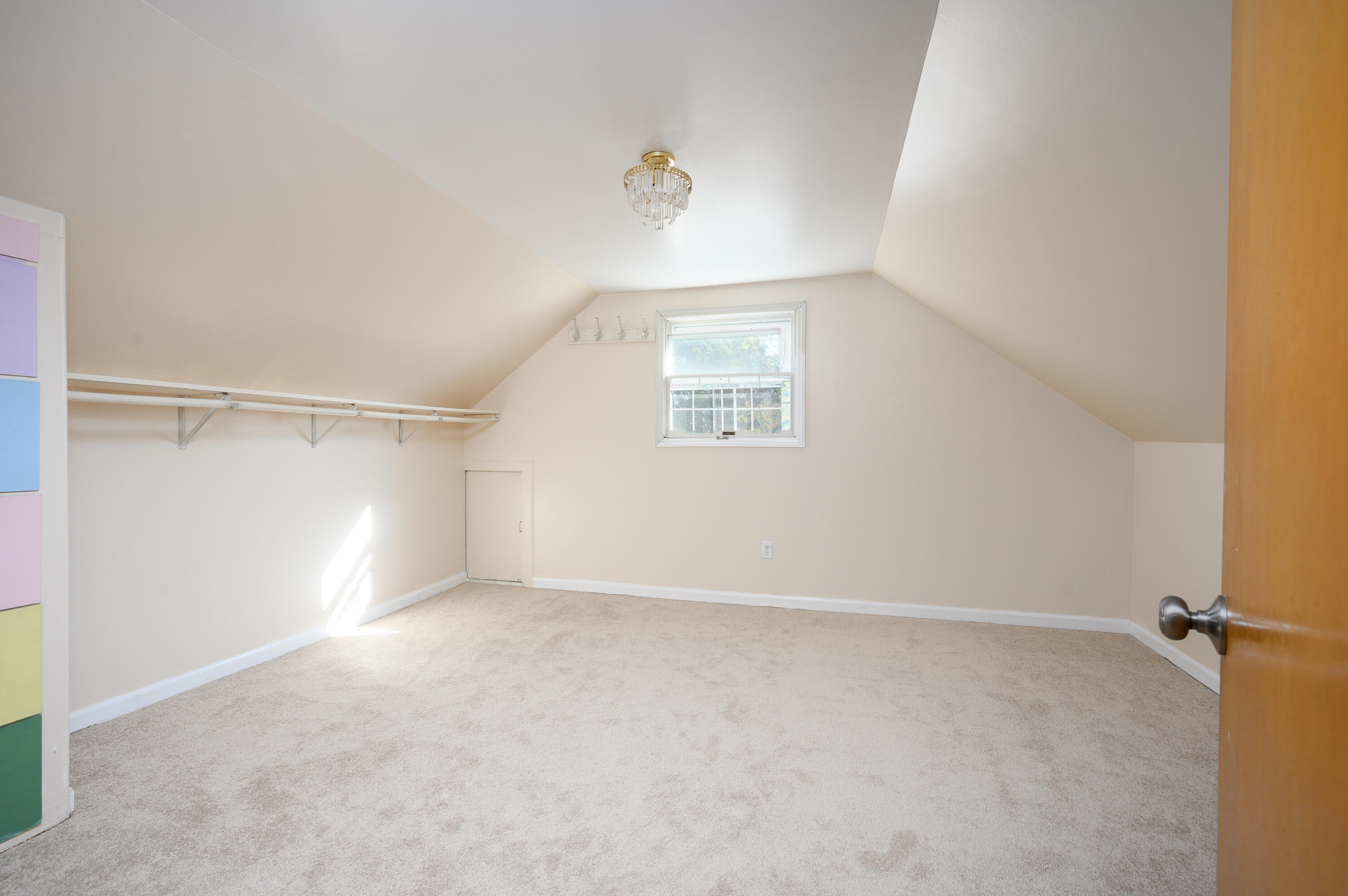 906 Shore Road Pocasset, MA 02559 - Photo 16 of 38 a view of an empty room with a window