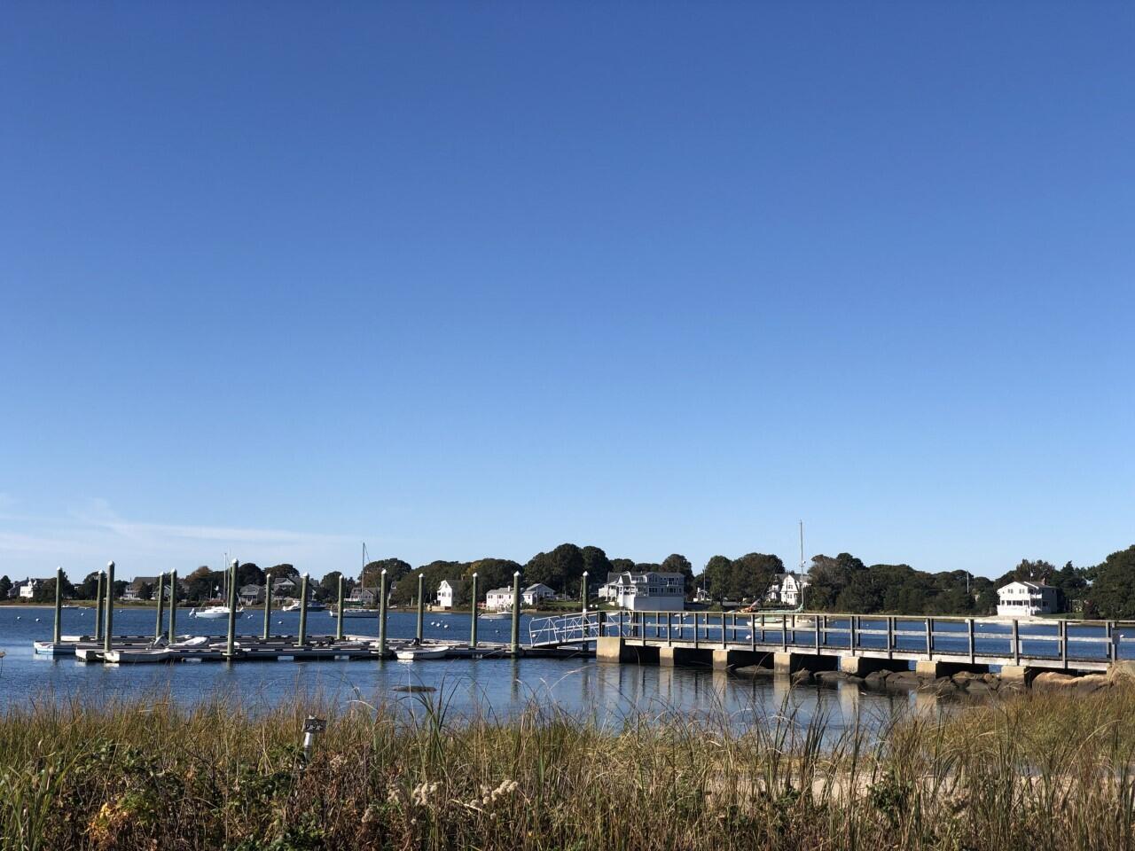 906 Shore Road Pocasset, MA 02559 - Photo 37 of 38 a view of a lake with houses