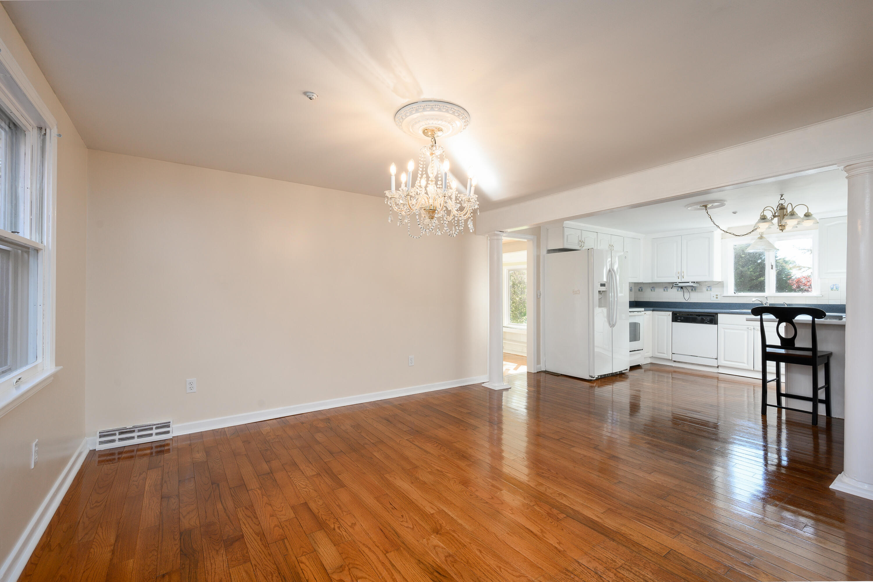 906 Shore Road Pocasset, MA 02559 - Photo 7 of 38 a view of a livingroom with a chandelier