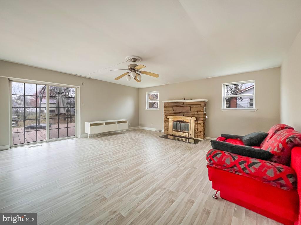 10 Makefield Road Morrisville, PA 19067 - Photo 15 of 46 a living room with furniture and a fireplace