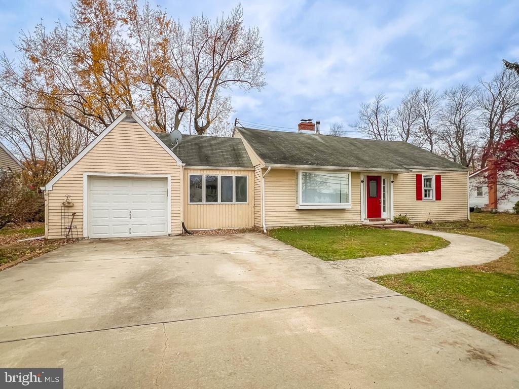 10 Makefield Road Morrisville, PA 19067 - Photo 45 of 46 a front view of a house with a yard and garage
