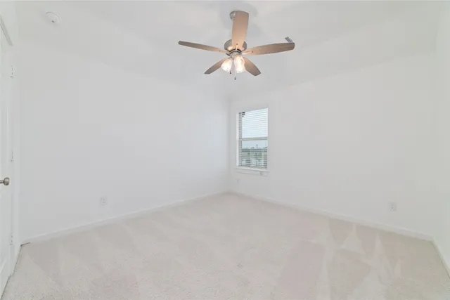 a view of a house with backyard and garden