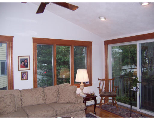 86 Valentine Road Arlington, MA 02476 - Photo 3 of 7 a living room with furniture and large window