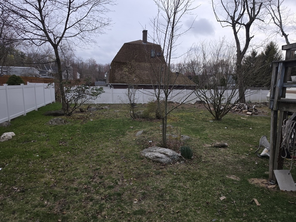 3 Hampton Street Worcester, MA 01604 - Photo 11 of 13 a backyard of a house with lots of green space