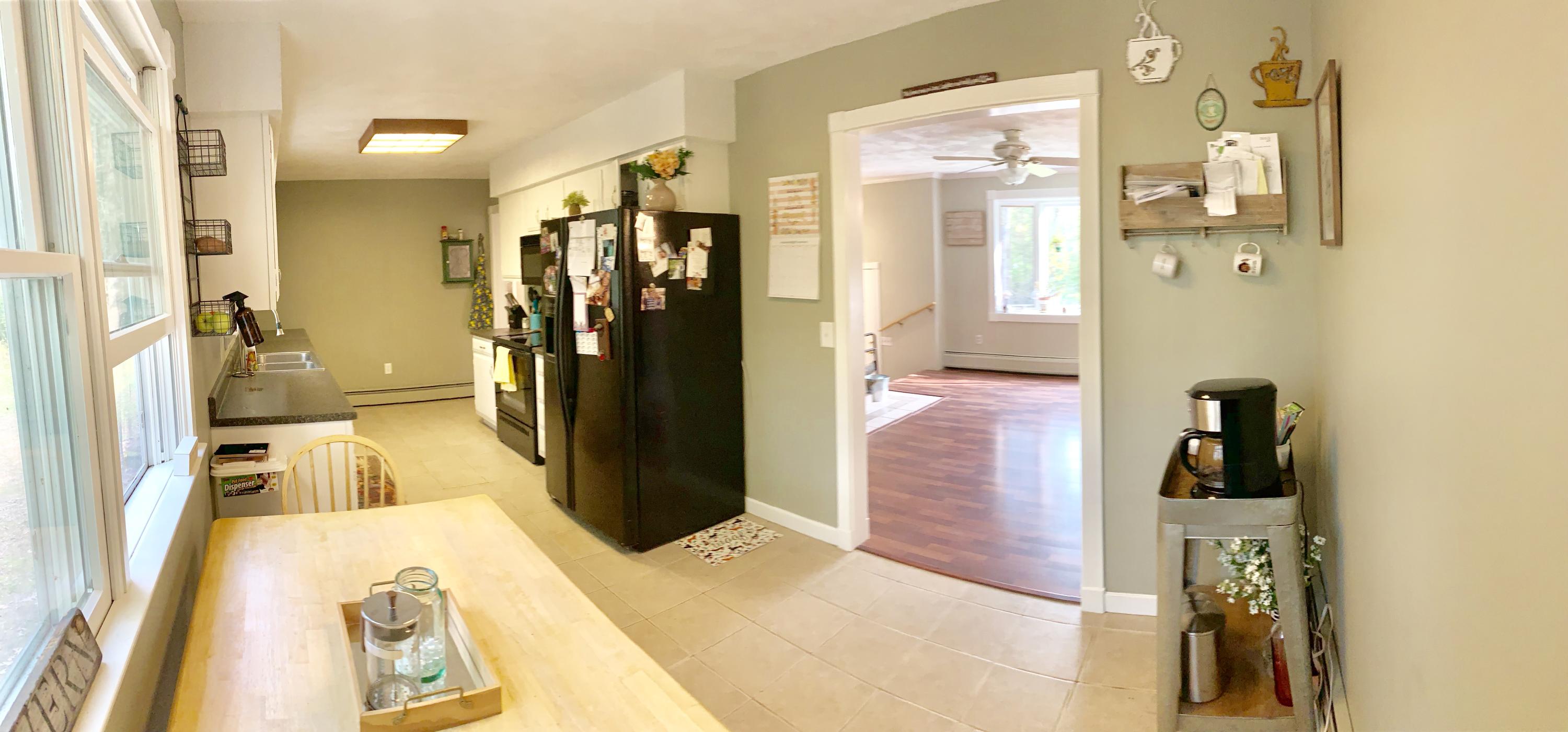 862 Levenseller Road Holden, ME 04429 - Photo 14 of 24 Kitchen/DR Leading to the Living Room