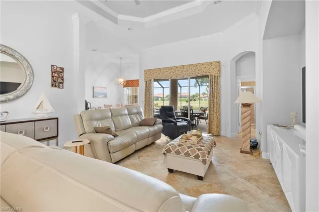 a living room with furniture and a couch