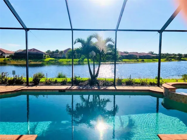 a view of swimming pool from a balcony