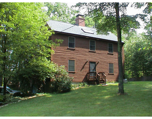63 S Road Fremont, NH 03044 - Photo 1 of 1 a view of a back yard of the house