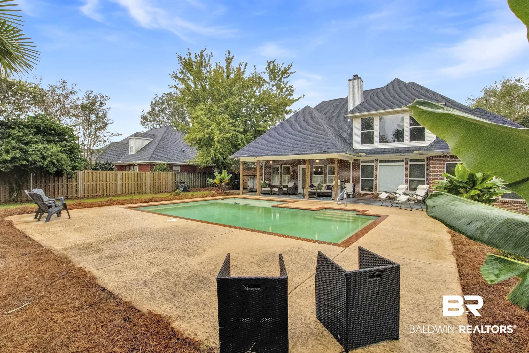 9002 Parliament Circle Daphne, AL 36526 - Photo 64 of 73 View of swimming pool with a patio area