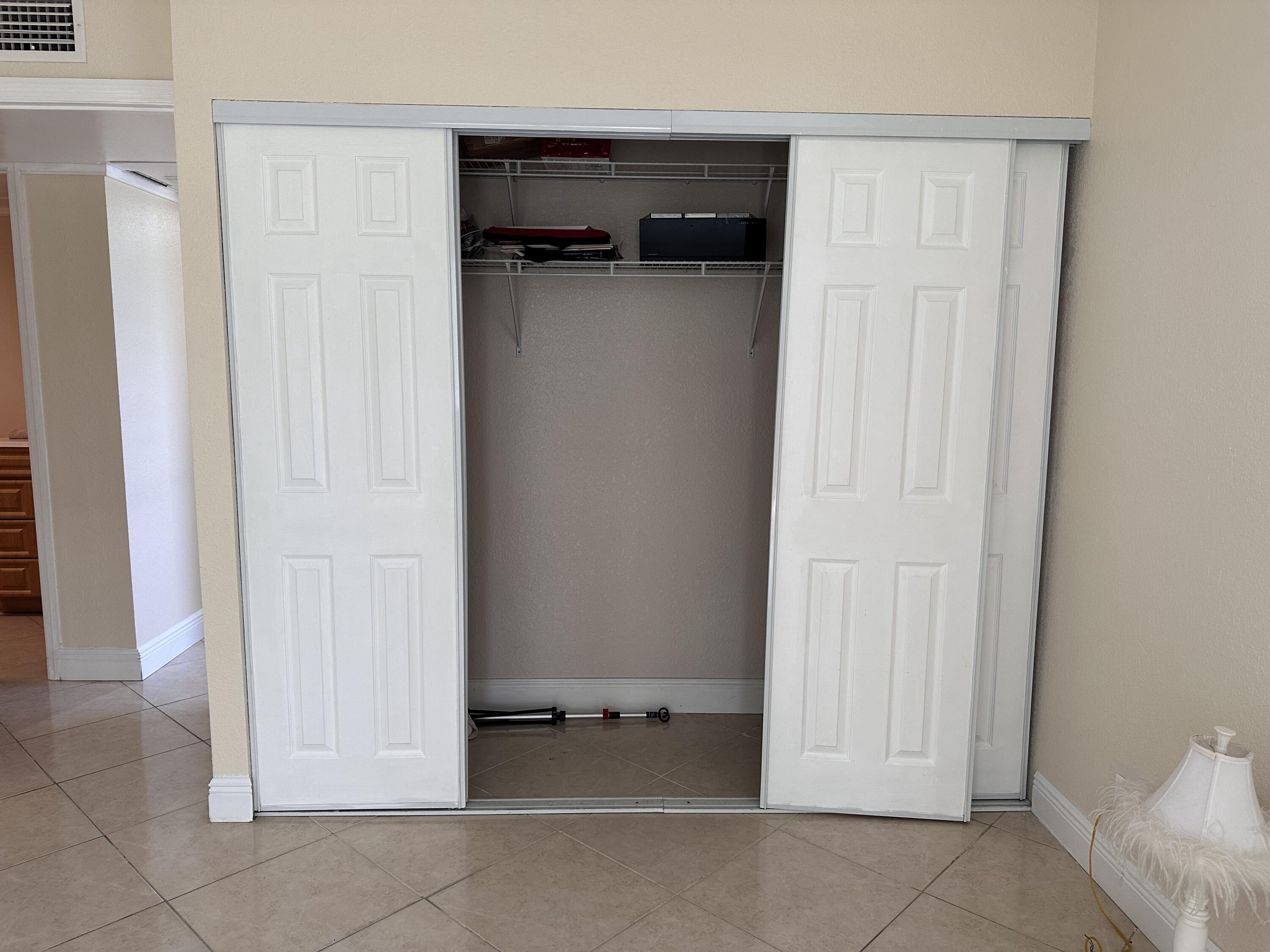 433 Saxony Way Delray Beach, FL 33446 - Photo 21 of 49 a view of walk in closet with empty racks