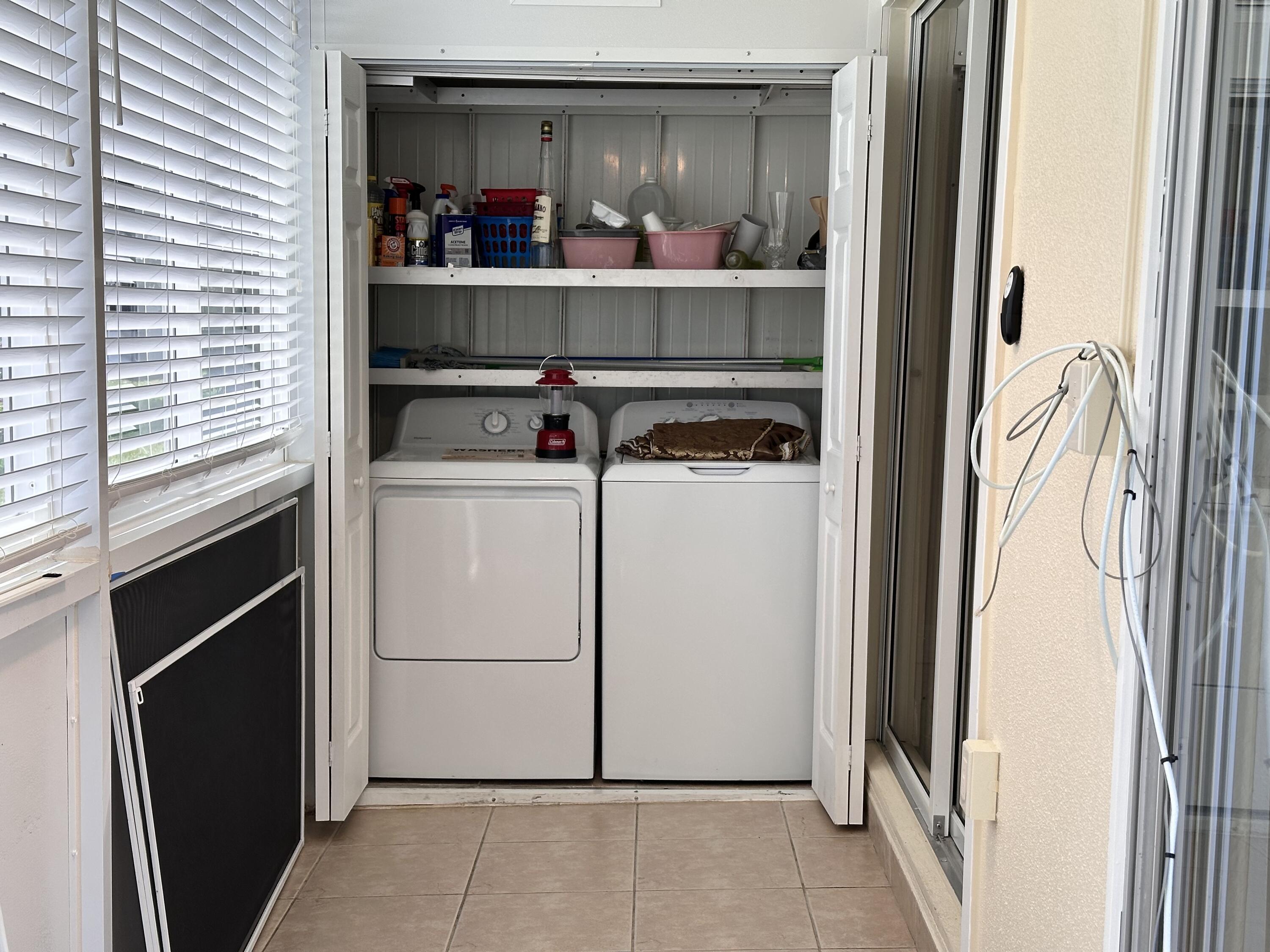 433 Saxony Way Delray Beach, FL 33446 - Photo 27 of 49 a room with storage and utility