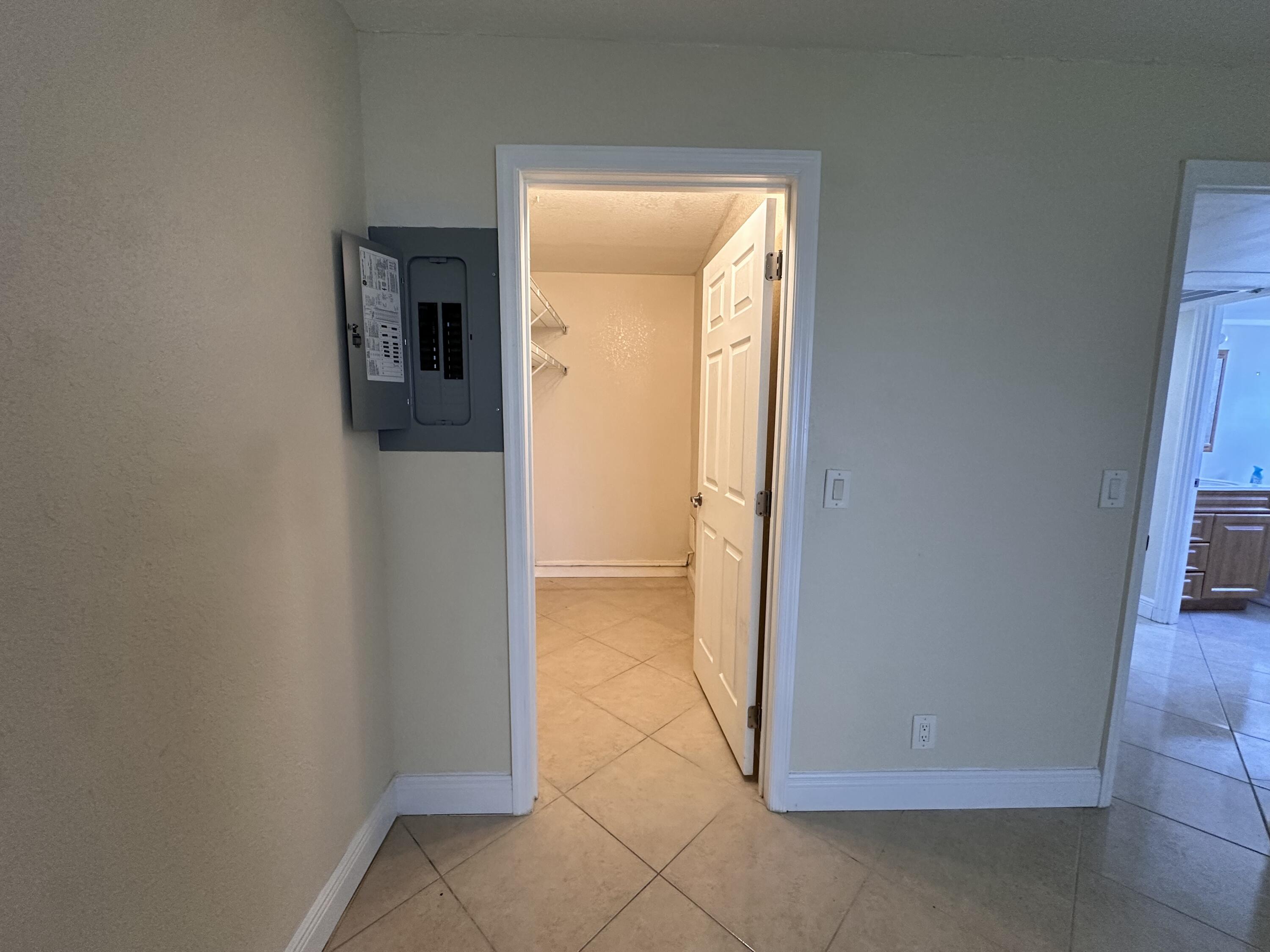 433 Saxony Way Delray Beach, FL 33446 - Photo 31 of 49 a view of a hallway with a door and a door