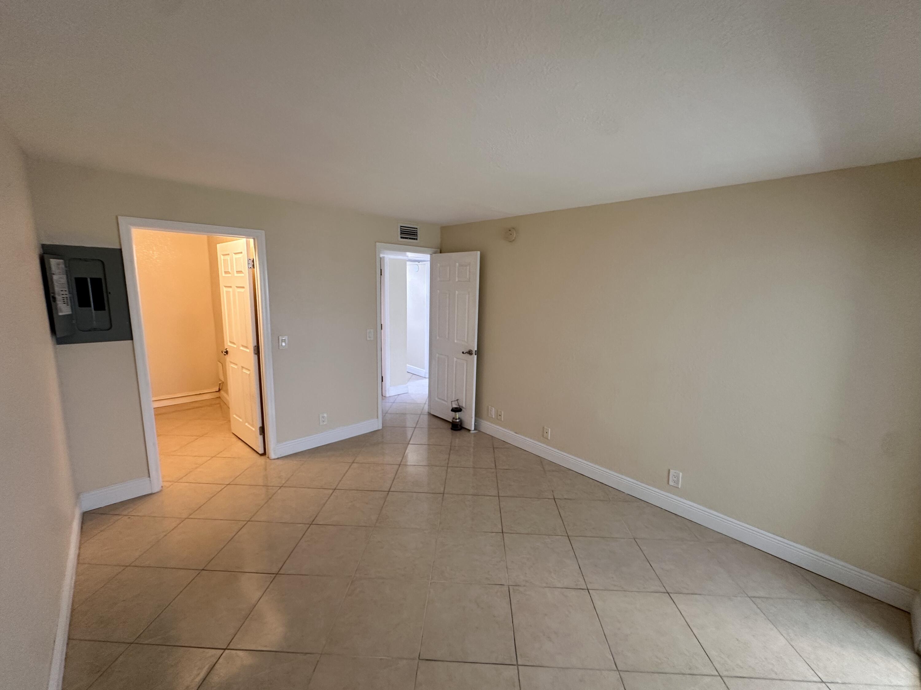 433 Saxony Way Delray Beach, FL 33446 - Photo 36 of 49 an empty room with a natural light