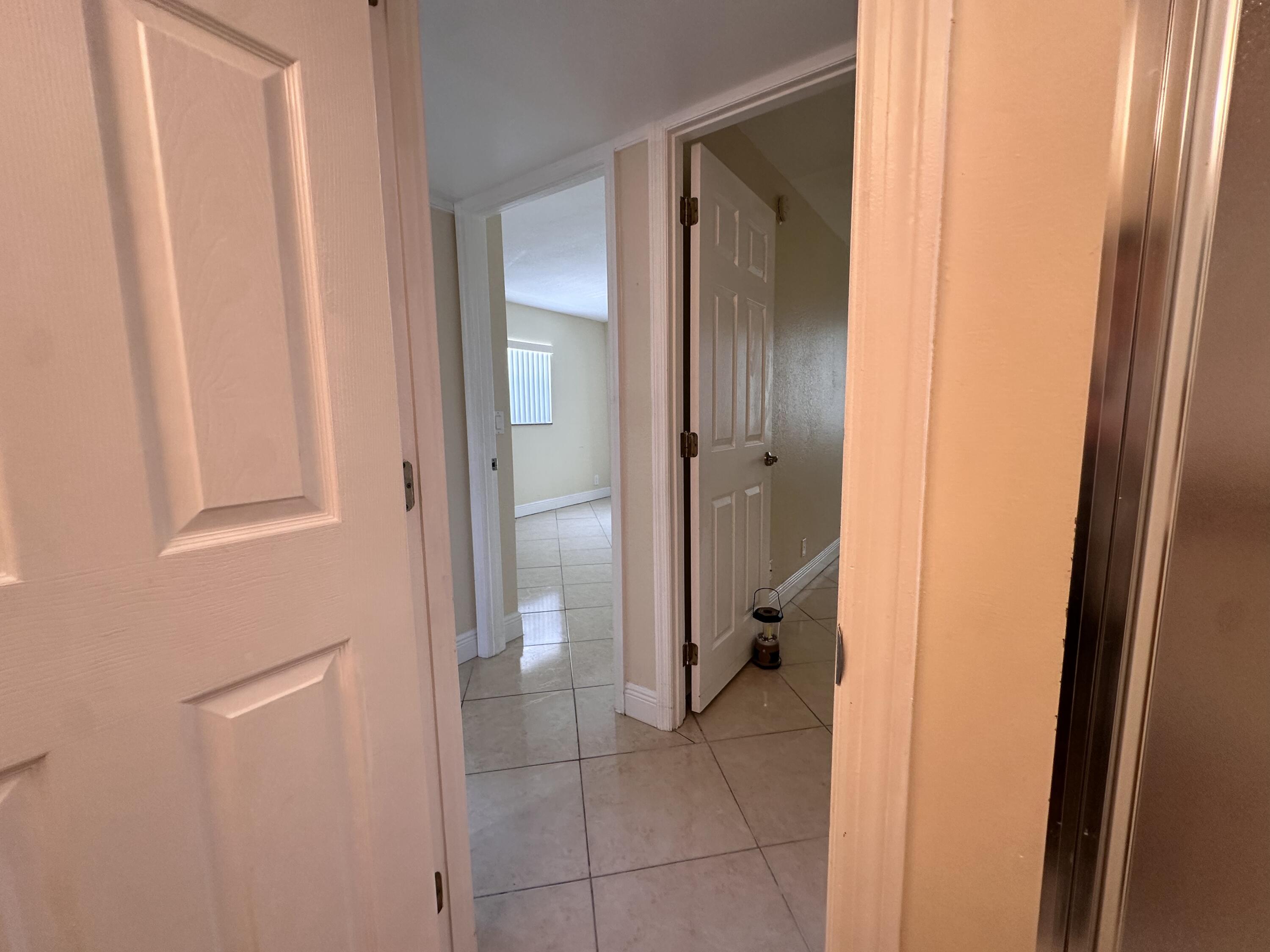 433 Saxony Way Delray Beach, FL 33446 - Photo 45 of 49 a bathroom with a shower and a sink