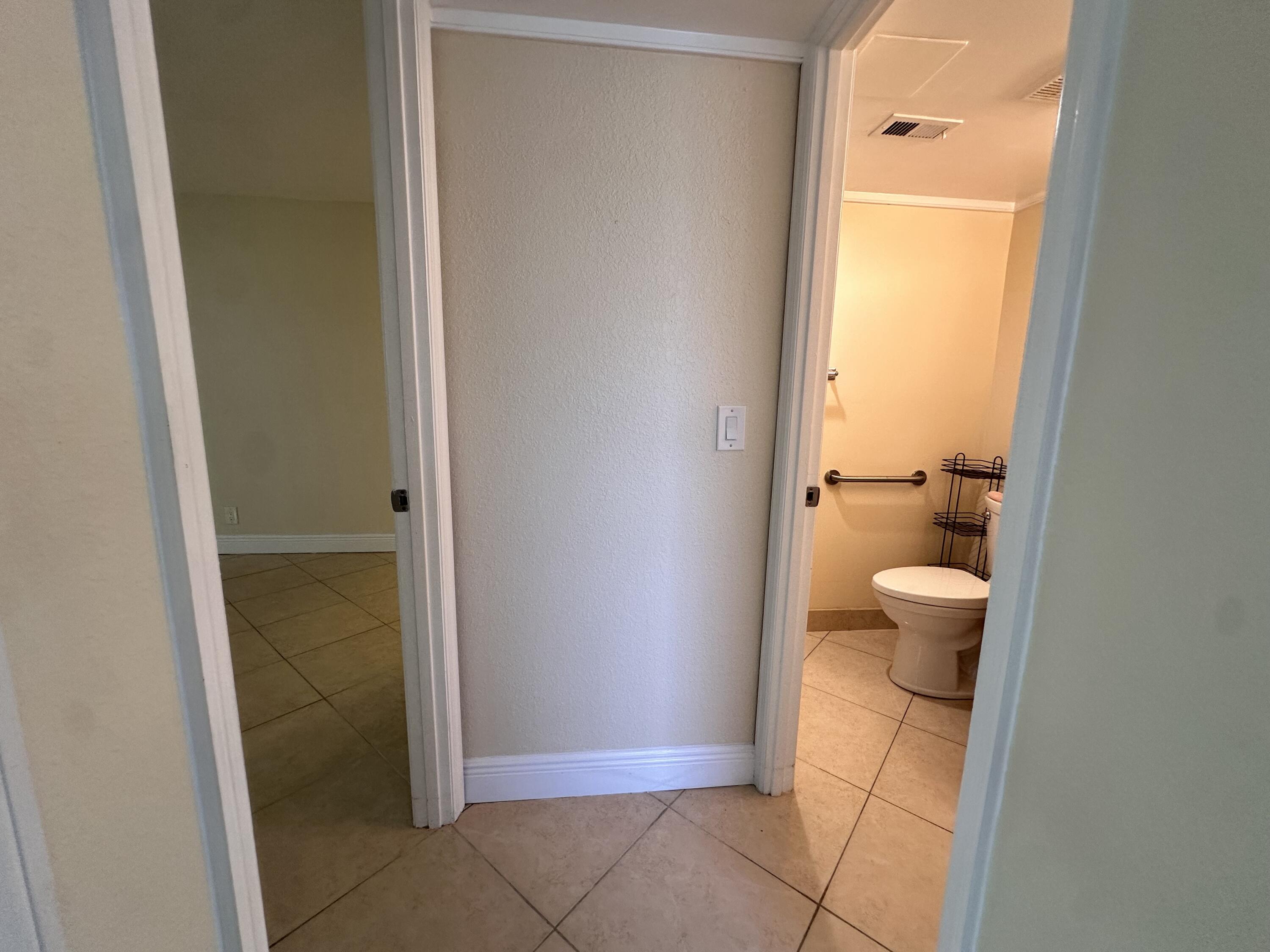 433 Saxony Way Delray Beach, FL 33446 - Photo 49 of 49 a bathroom with a granite countertop shower a toilet and a sink