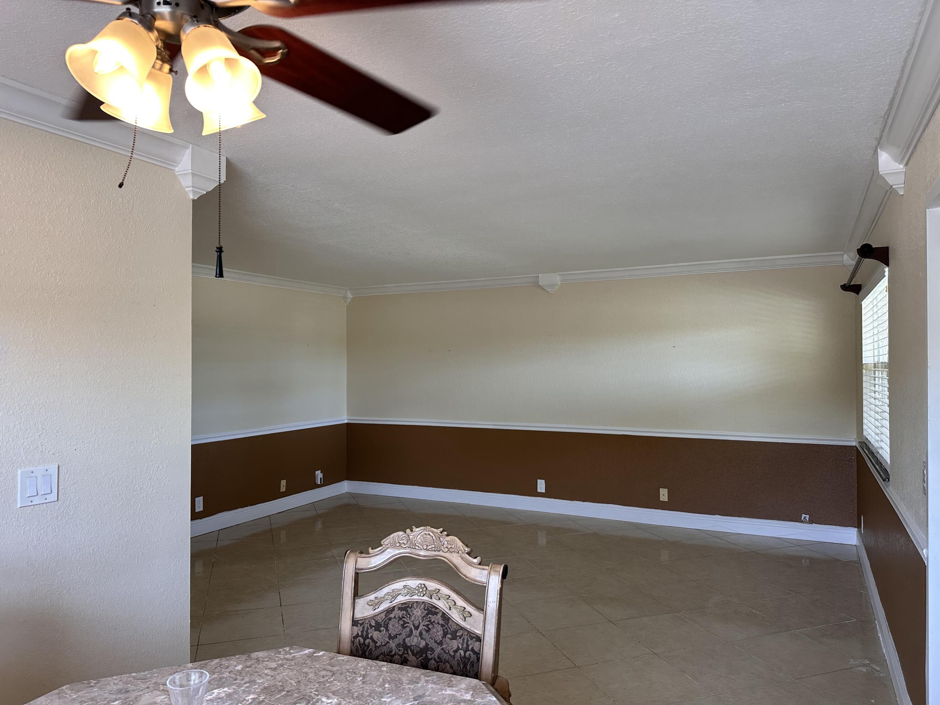 433 Saxony Way Delray Beach, FL 33446 - Photo 7 of 49 a view of room with a ceiling fan