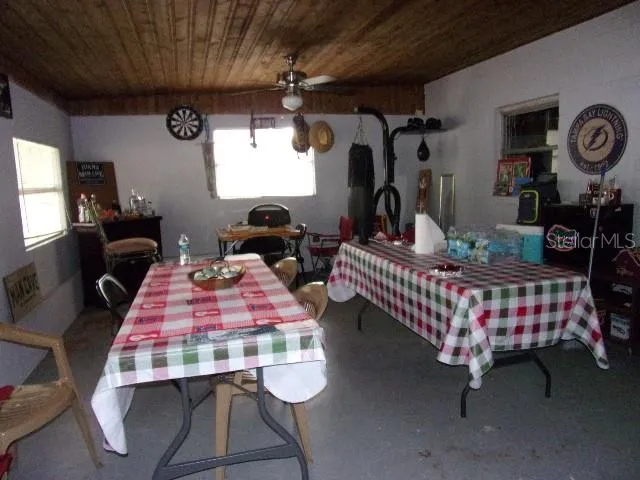 a bedroom with bed and a window