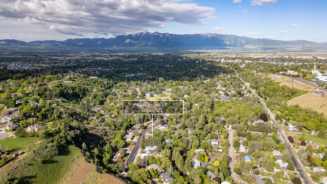 1365 Sumac Drive Logan, UT 84321 - Photo 46 of 66 Extensive neighborhood with mature trees and a distant mountain range