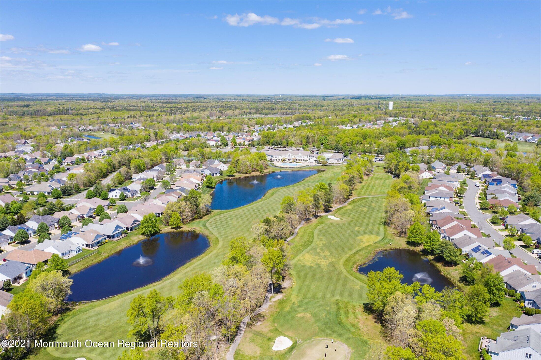 21 Shoal Road Jackson, NJ 08527 - Photo 50 of 60 an aerial view of residential houses with outdoor space