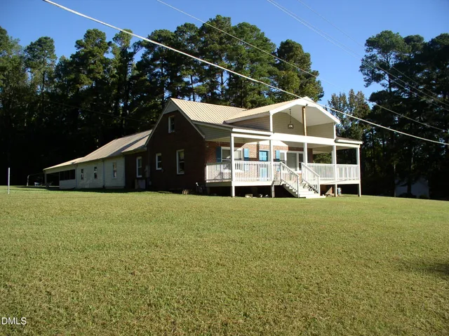 a house view with a garden space