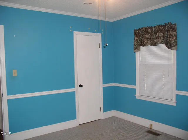 a bedroom with a small space