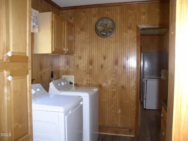 an empty room with a ceiling fan