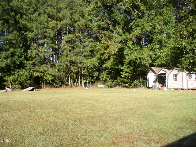 a view of an ocean beach and mountain