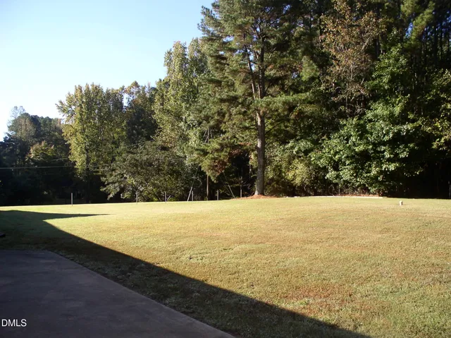 a view of a brick house with wooden floor