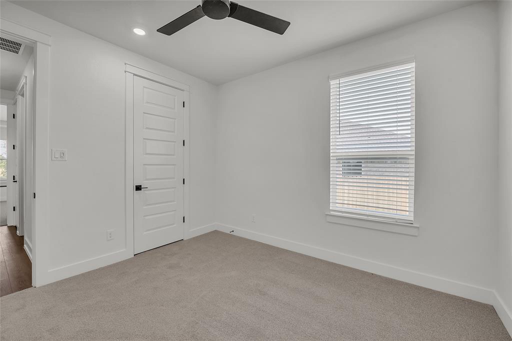 229 Lasso Loop Lorena, TX 76655 - Photo 25 of 30 an empty room with windows