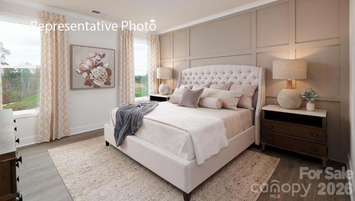 4139 Round Table Drive Gastonia, NC 28056 - Photo 12 of 24 a bedroom with a bed and a window