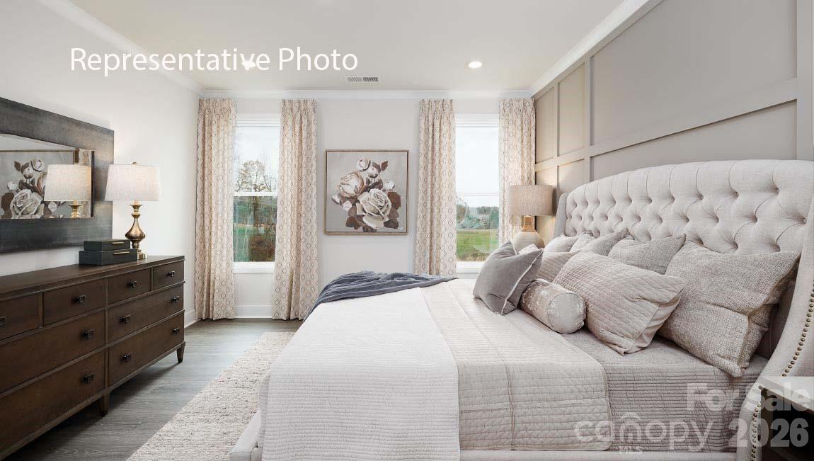 4139 Round Table Drive Gastonia, NC 28056 - Photo 14 of 24 a bedroom with a large bed and a dresser